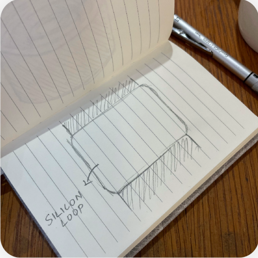 Notebook concept sketch exploring Morva's silicone carry loop
