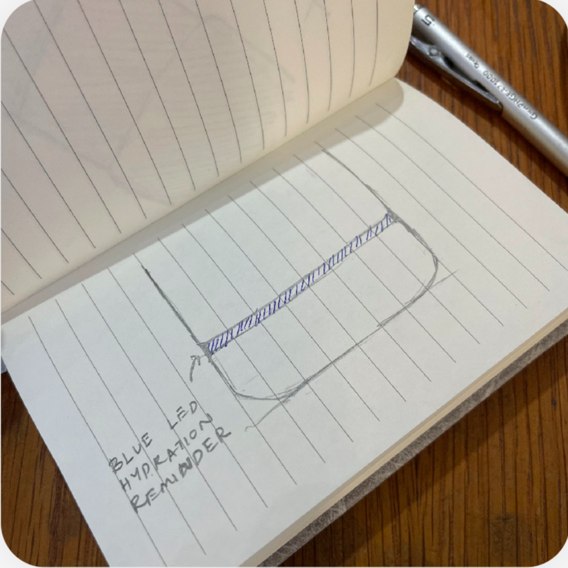 Notebook concept sketch exploring Morva's blue hydration-reminder ring